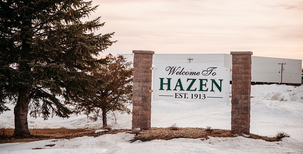 Hazen's welcome sign surrounded by snow